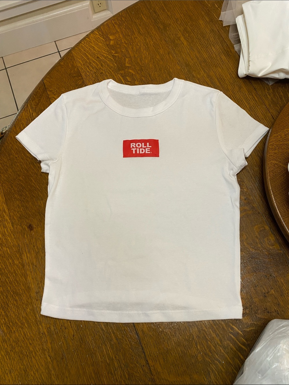 White T-Shirt with Red 'Roll Tide' Graphic size xs women’s from the Pants Store